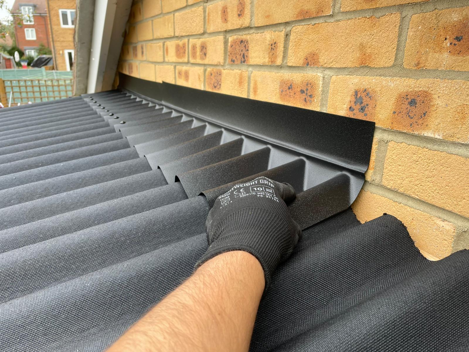 Weatherproofing attachment for Onduline roofing
