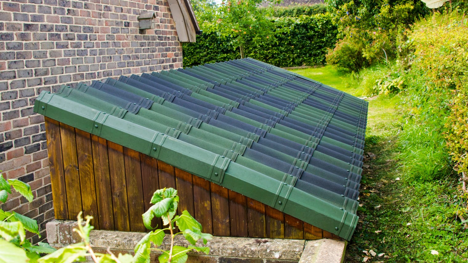 Green ONDUVILLA tile sheets from Onduline