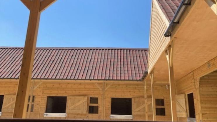 ONDUVILLA shaded red stable block 