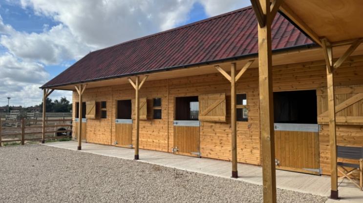 ONDUVILLA shaded red stable block 