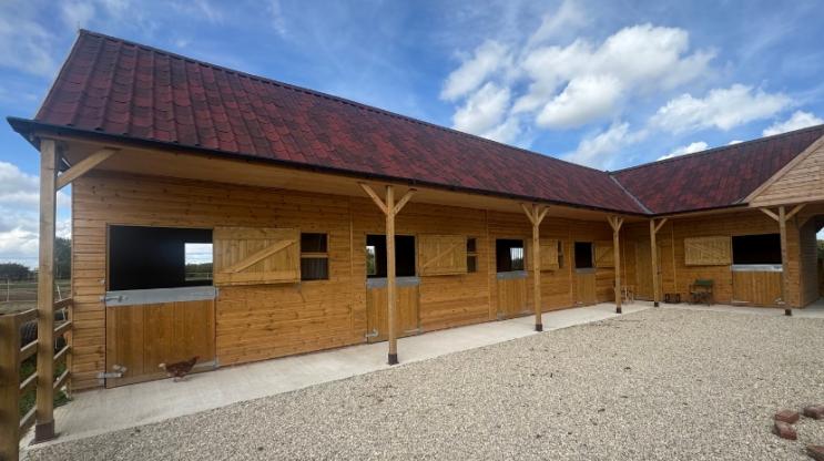ONDUVILLA shaded red stable block 