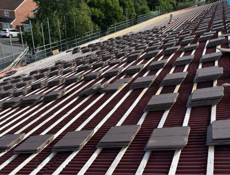 ISOLINE LOW LINE Installed on a low pitched roof with Northstone tiles