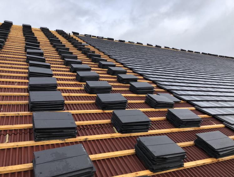ISOLINE LOW LINE and Northstone Tiles being used on a Aldi re-roofing project