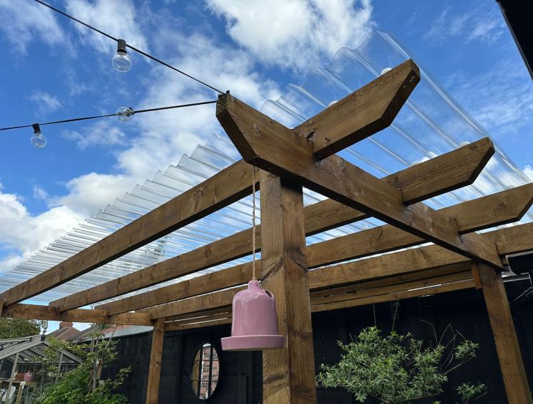 Sammy Stringers pergola featuring ONDUCLAIR PC sheets
