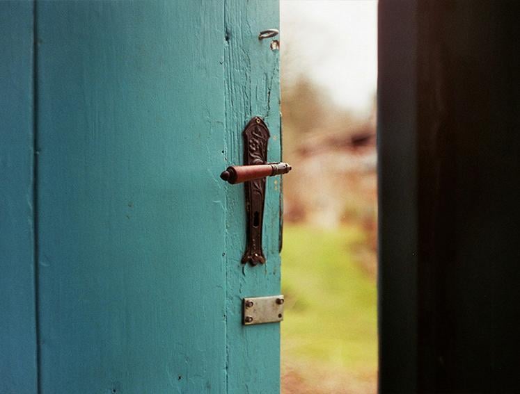 A garden shed door ajar
