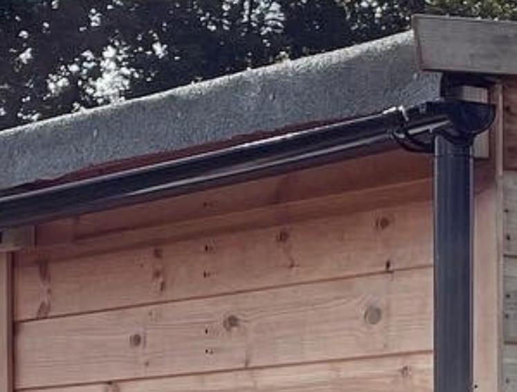 Garden shed with guttering