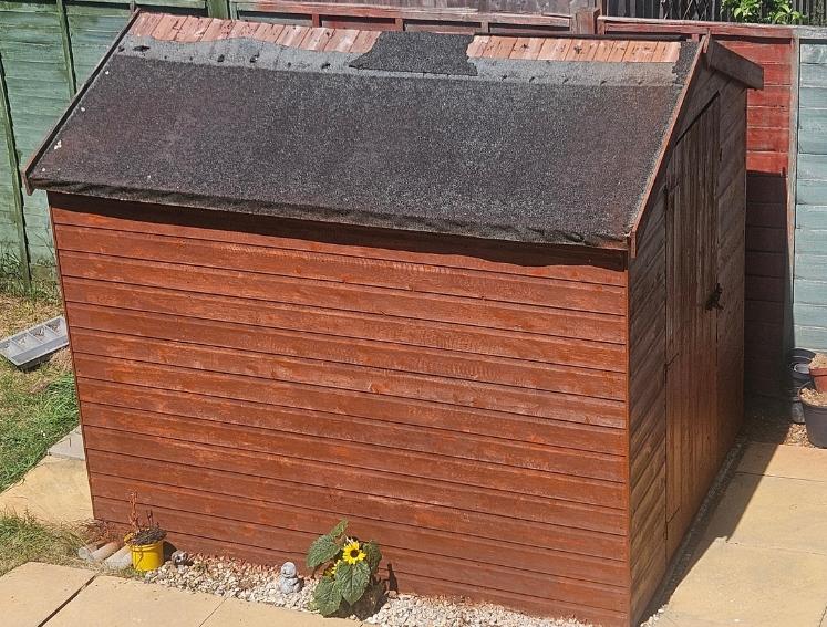 Damaged roof on garden shed