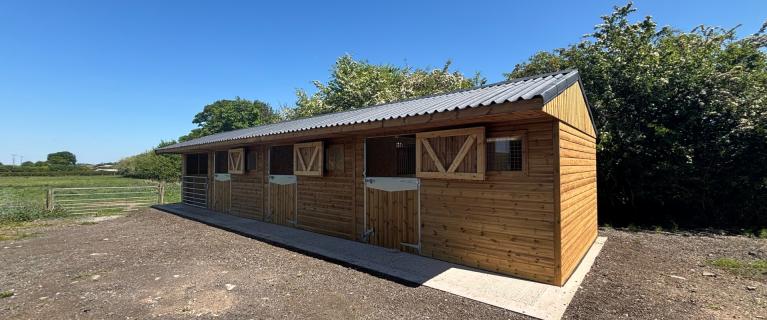Cheshire stables featuring Onduline roofing