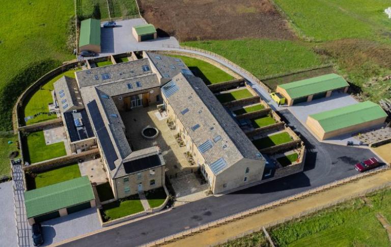 ONDULINE CLASSIC in green on garage roofs